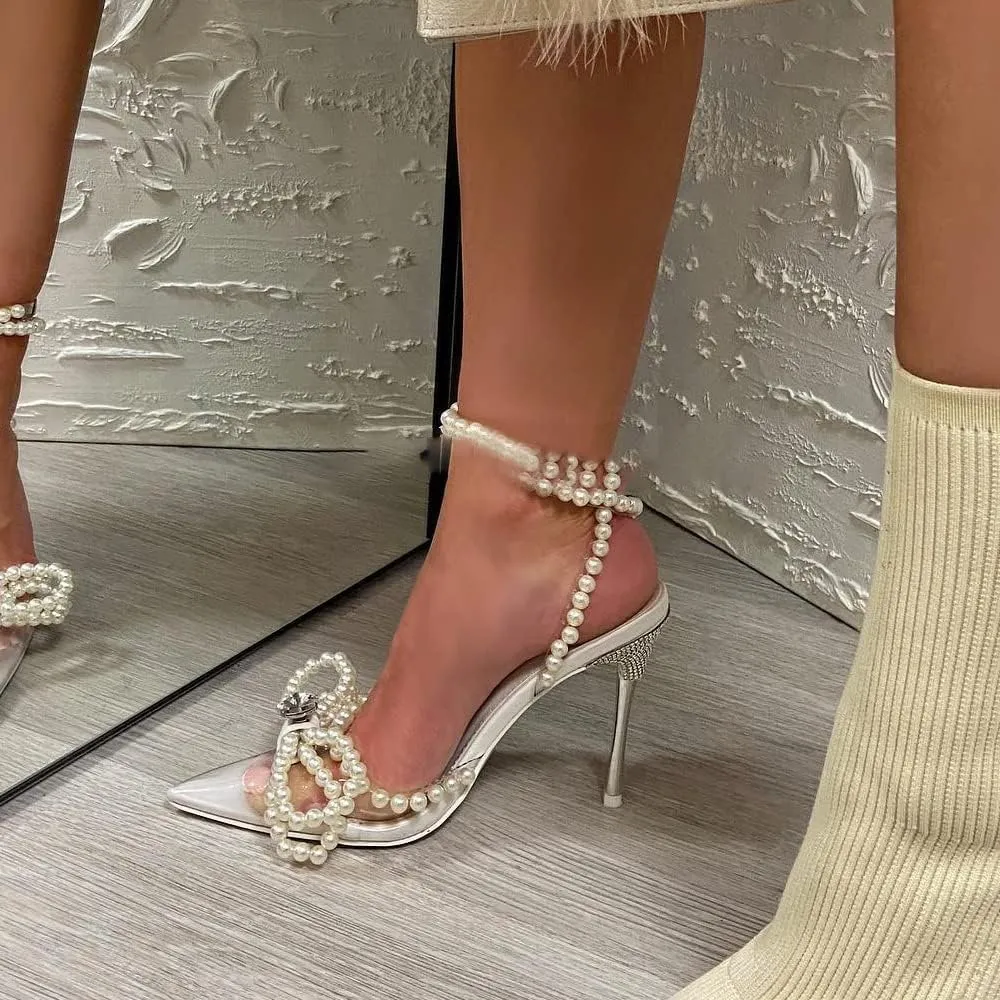 YIYA Women's Pointed Toe Clear Heels Sandals with Strappy Pearls Ankle Strap Sexy Rhinestone Bow Heels Stiletto High Heel Wedding Party Pumps Shoes